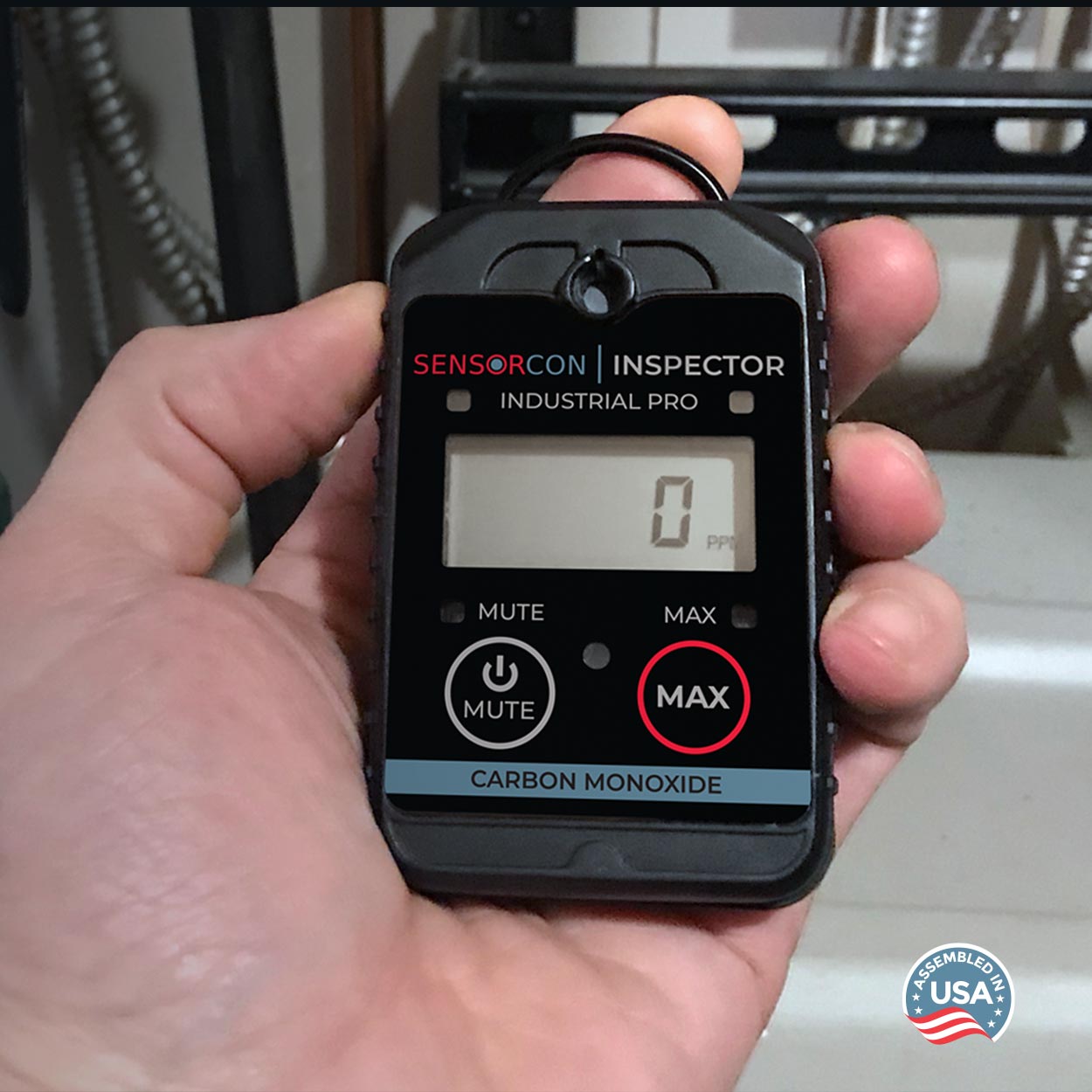 Close up of Inspector Industrial pro in the hand of and HVAC technician with assembled in USA icon