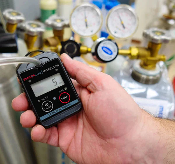 Closeup of inspector in hand during calibration